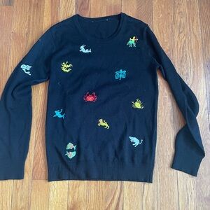 Vintage black wool sweater with zodiac symbols